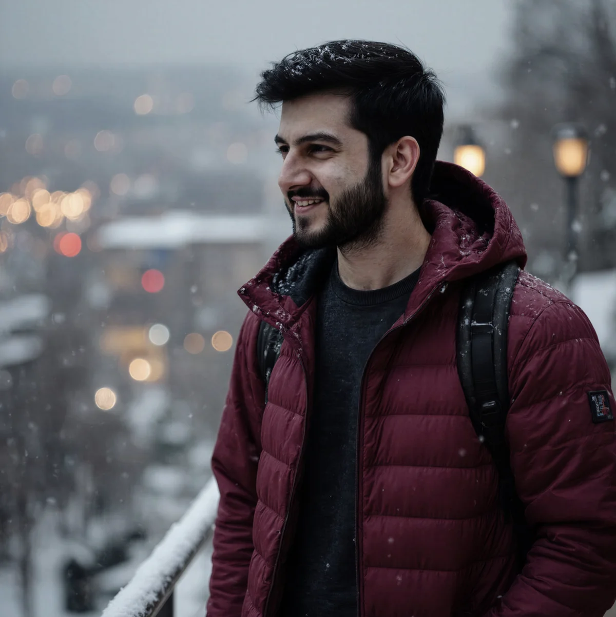 Dating profile picture of a man standing in the snow smiling